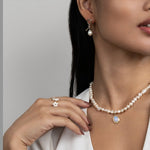 Tereza-Sofie – Orecchini in argento dalla forma curva.