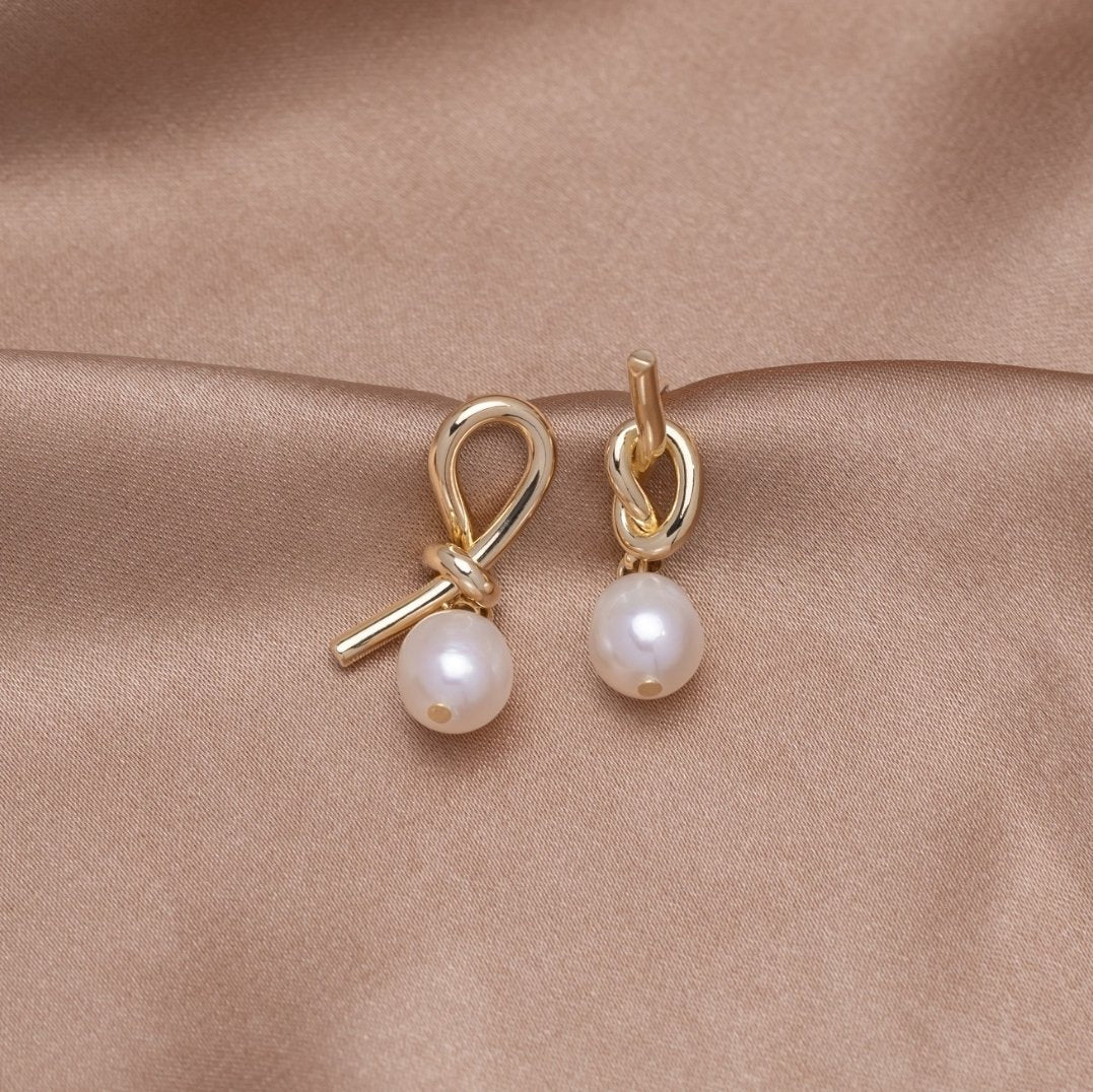 Tereza-Sofie – Orecchini in argento dalla forma curva.