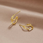 Mariana – Orecchini in argento dalla silhouette stretta.