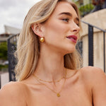 Annalena – Doppia catena in oro con pendente.