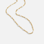 Sabina – Collana girocollo in oro fino con mini-perle.
