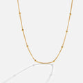 Fiona – Collana dorata con mini charm