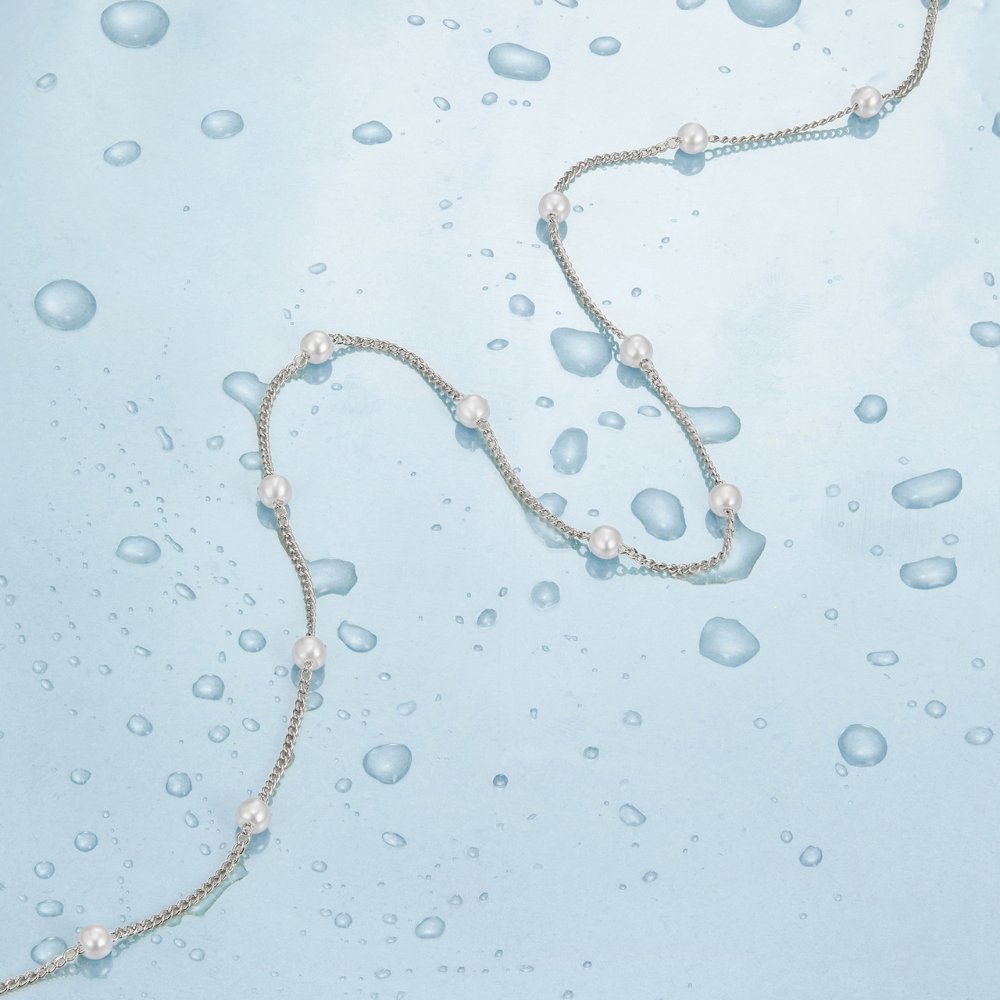 Johana – Collana dorata con pendente floreale