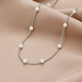 Johana – Collana dorata con pendente floreale