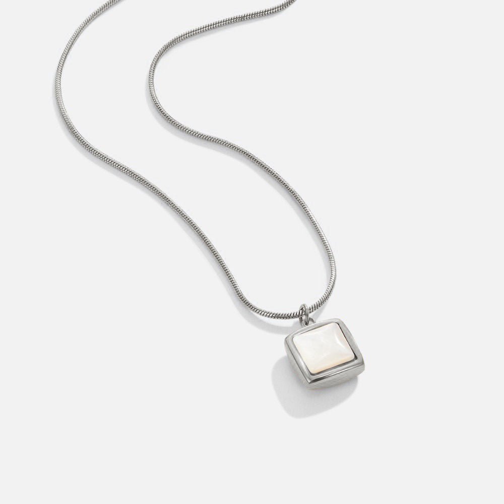 Silvie – Collana dorata con mini placchette