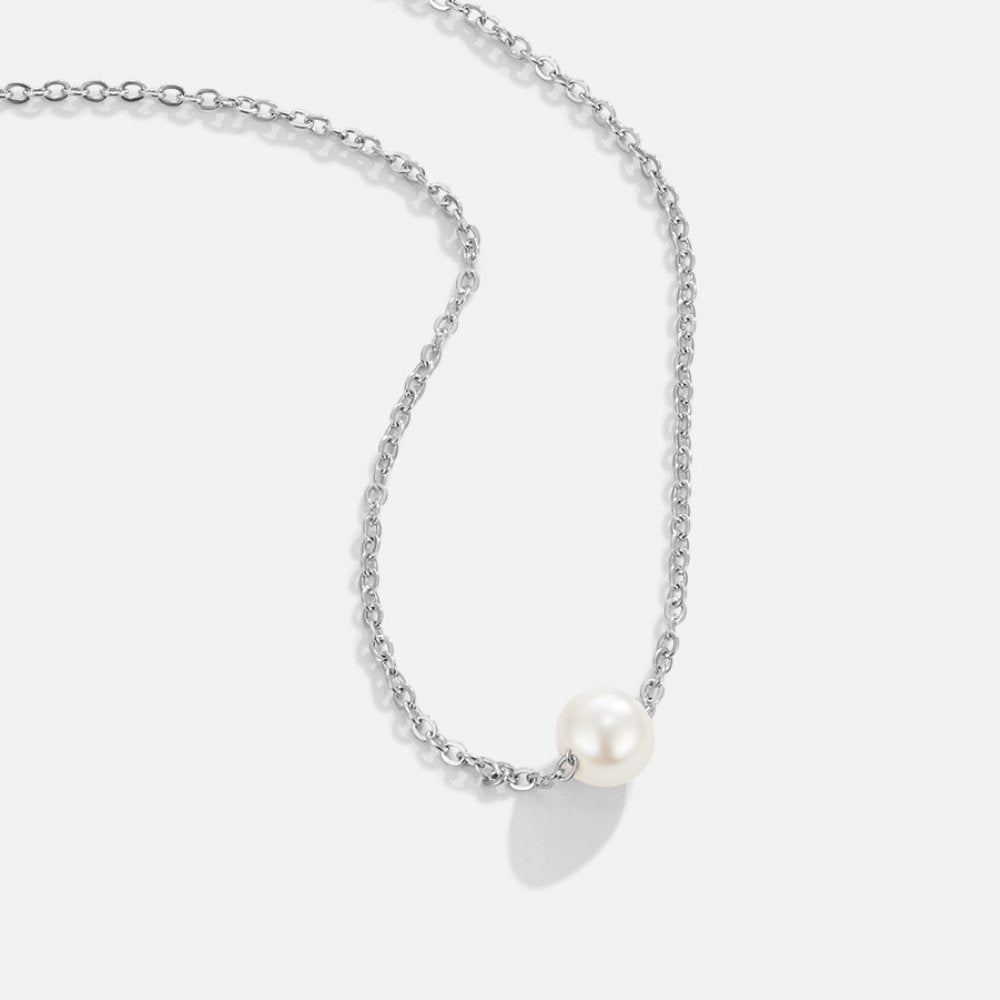 Clara – Collana dorata con pendente rotondo