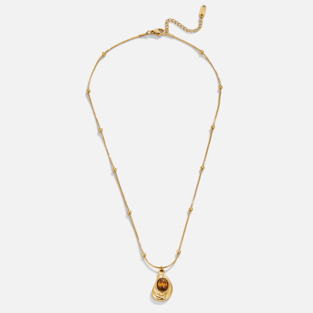 Leonie – Catenina con pendente rotondo dorato