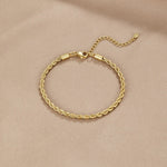 Braccialetto in oro intrecciato ed elegante