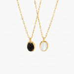 Veronika – Collana doppia in oro con dettagli neri.