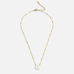 Alena – Collana in oro con pendente a forma di fiore.